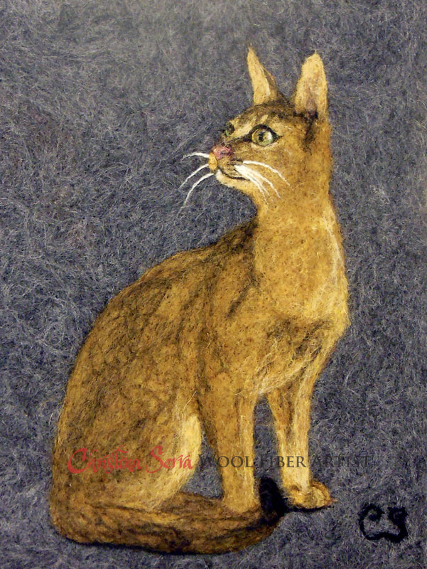 artwork wool painting of a caramel colored Abyssinian house cat with a grey background