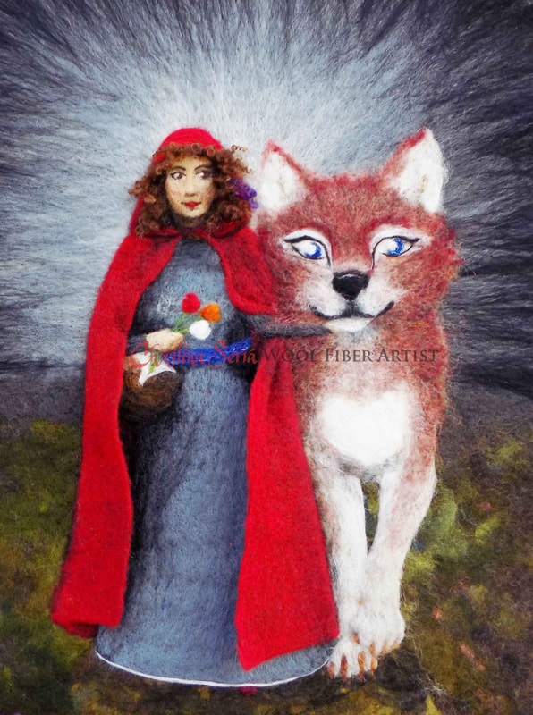 artwork painting made with wool of a woman wearing a red hooded cloak, holding flowers in one hand, walking next to a huge red wolf. the background is a blur of greys and greens.
